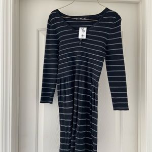 Light sweater dress. Brand new with tag. Black and gray stripes. Brand “Ming”.